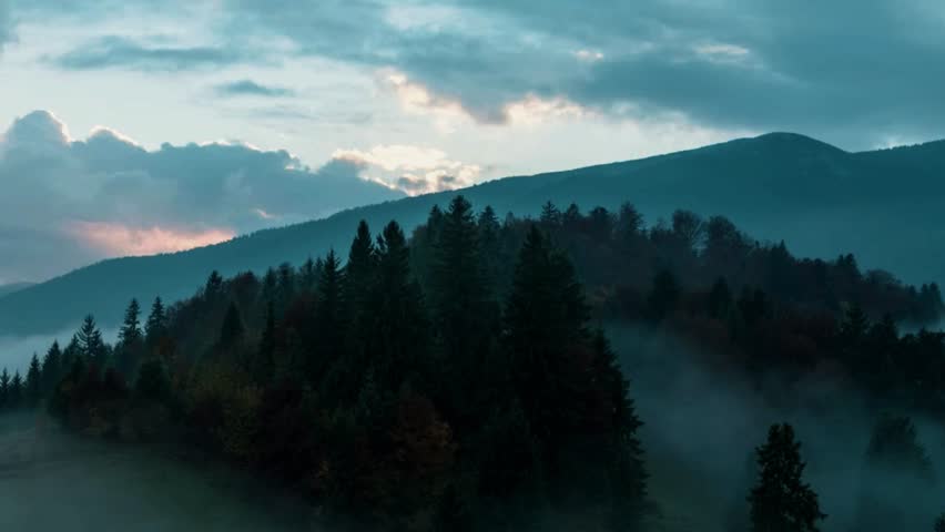 misty mountain aerial, cinematic mountain landscape, 4k mountain view, tranquil misty peaks, aerial scenic mountains, cinematic nature drone, foggy mountain range, breathtaking 4k, cinematic 