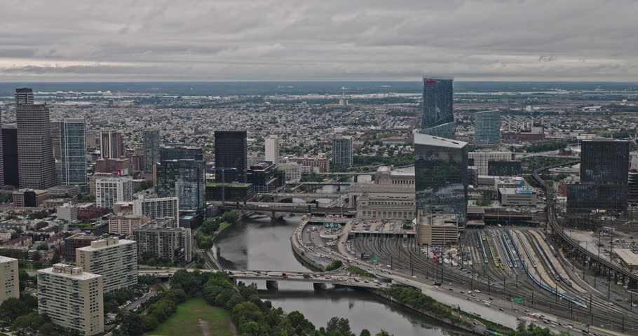 Philadelphia Pennsylvania Aerial v147 flyover Schuylkill River capturing bridge crossings and panoramic panning views of downtown cityscape under overcast sky - Shot with Inspire 3 8k - Sept 29th 2023
