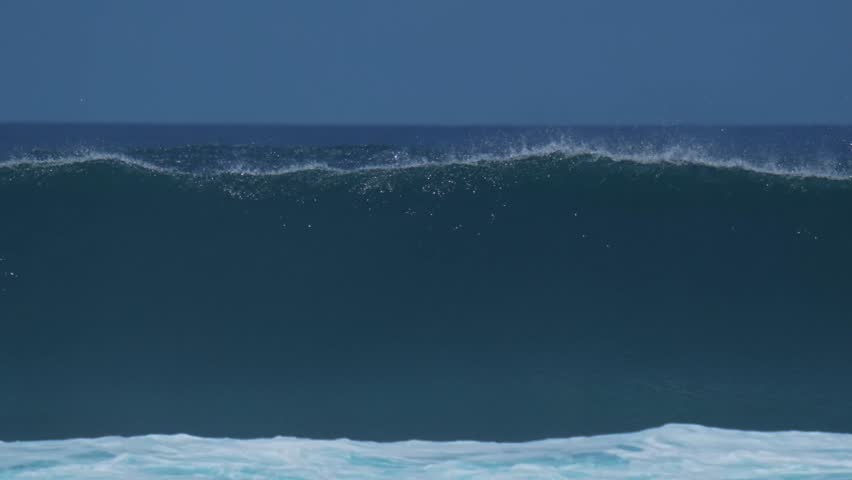 Breaking wave in Indian Ocean at stormy day.Maldives.Slow motion
