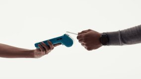 A hand holds a blue payment terminal as another person taps a credit card for a swift contactless transaction. This showcases modern financial technology. - Powered by Shutterstock - Get 15% off with code: PIKWIZARD15