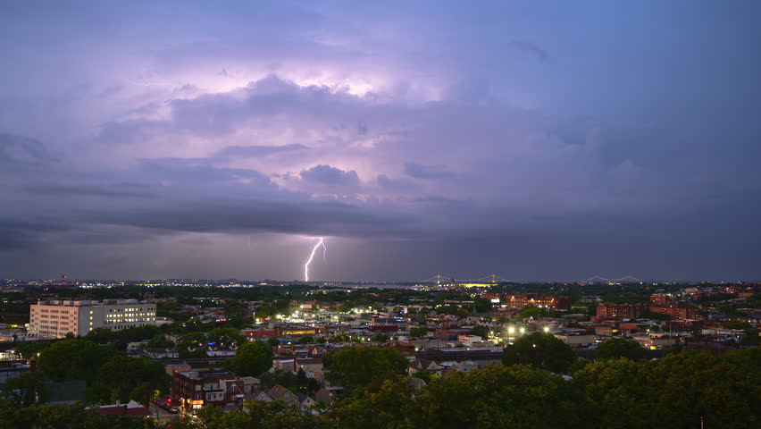 Lightning storm over Northern Queens in New York City. LGA airport, Whitestone bridge and Throgsneck bridge are in view. 