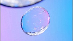 Macro Iridescent Water Drop Floating Glass Effect Pastel Gradient Background Video - Powered by Shutterstock - Get 15% off with code: PIKWIZARD15
