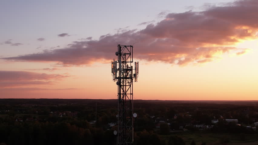 Aerial View of Tower Antenna Telecommunication Cell Phone, Radio Transmitters of Cellular 5g 4g Mobile Phone. Cellular Mobile Signals Providing High Speed 4g and Modern 5g Traffic Network Service.
