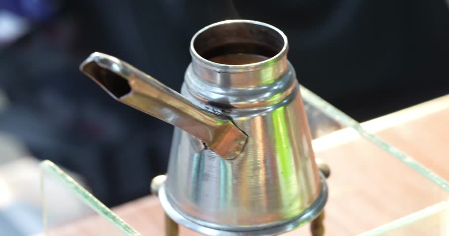 A coffee pot for brewing coffee, a traditional coffee pot such as those used in Ethiopian coffee ceremonies	