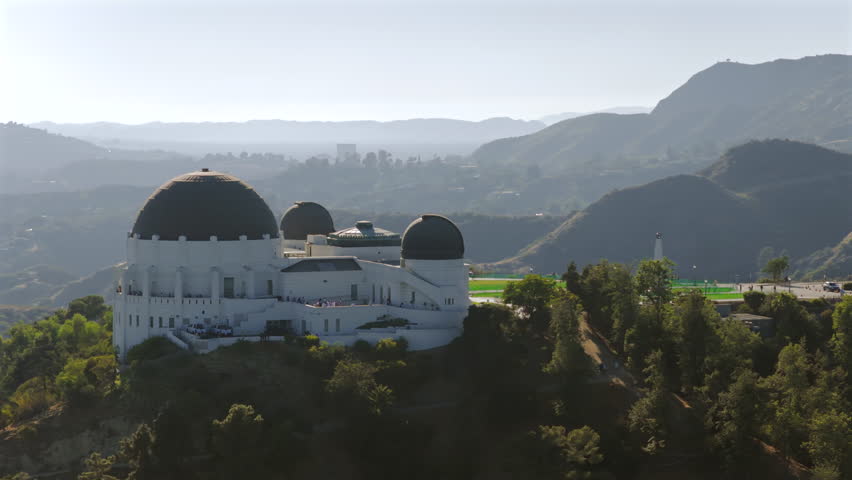 Los Angeles 07.07.2024. Stunning aerial shots of renowned Griffith observatory beautifully situated amid lush, green hills and rolling valleys. Perfect for tourist of nature and architecture alike