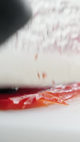 Slicing white radish for garnish or sushi filling