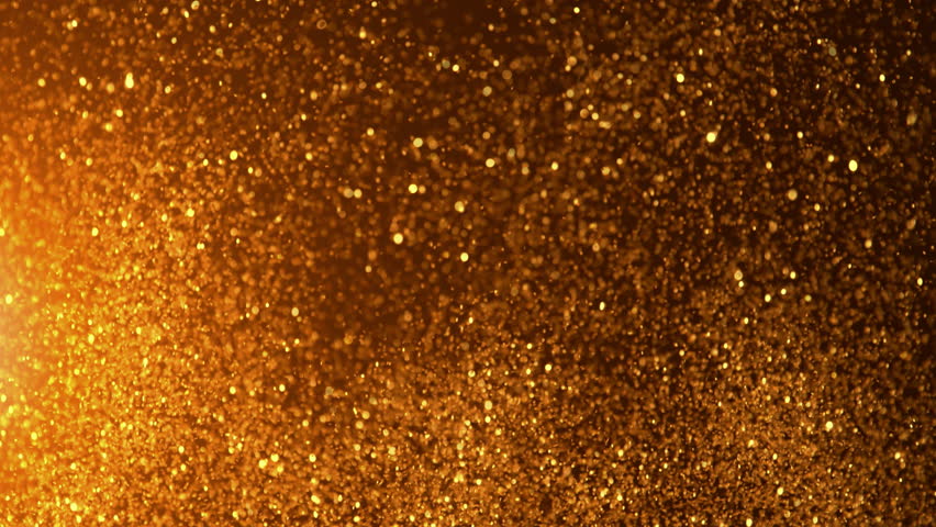Super Slow Motion Shot of Glittering Golden Background at 1000fps.