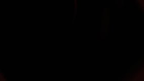 Dark background with red and brown light streaks. Vertical motion blur effect creates dynamic lines. Subtle variations in color intensity. - Powered by Shutterstock - Get 15% off with code: PIKWIZARD15