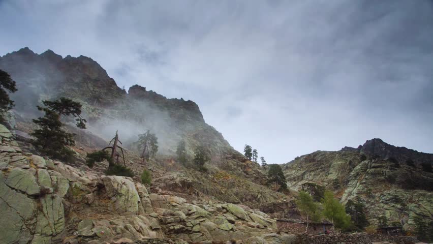 Dynamic time lapse of extreme terrain showing rugged cliffs, barren rocks, and dramatic skies. Perfect for adventure, geology, earth science, exploration, documentaries, and cinematic landscapes.