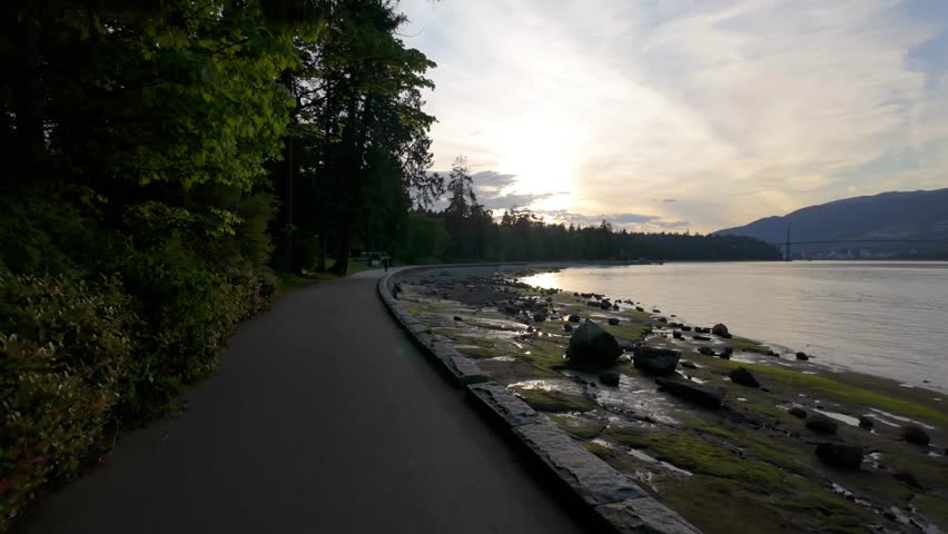 Sunset Views Along the Iconic Stanley Park Seawall in Downtown Vancouver, British Columbia