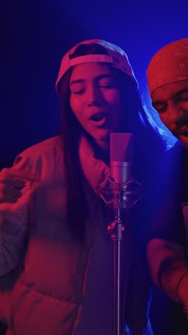 Rappers singing and pointing in slow motion