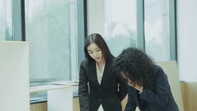 Two female architects working at office with blueprint, one on phone and another pointing, concept of teamwork, construction planning and professional design - Powered by Shutterstock - Get 15% off with code: PIKWIZARD15