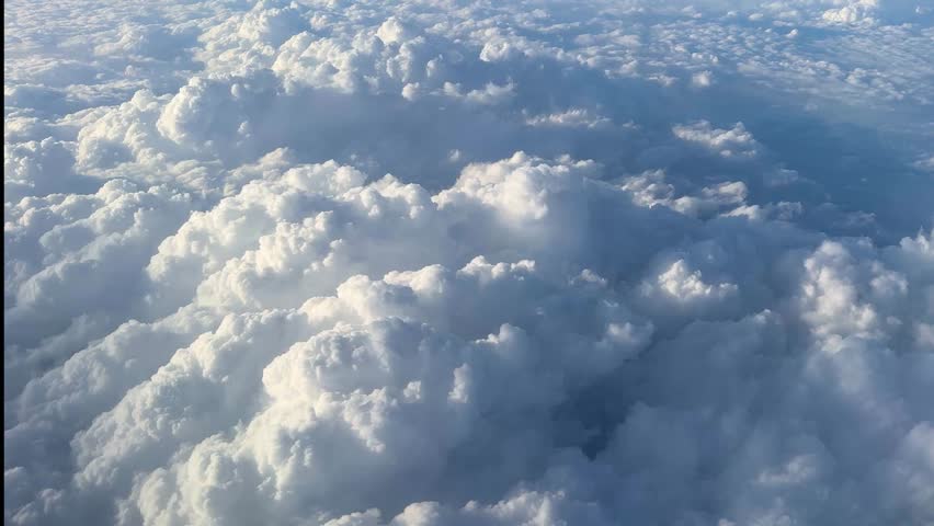 CAPE VERDE - 8.20.2025 - Gorgeous aerial view of the clouds over Cape Verde taken from the plane.
