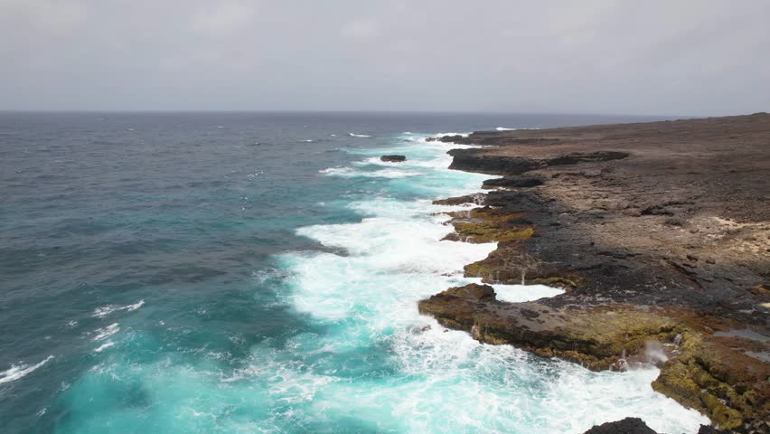 CAPE VERDE - 8.20.2025 - Very good aerial footage pulling back from the rocky coastline of San Vicente, Cape Verde.