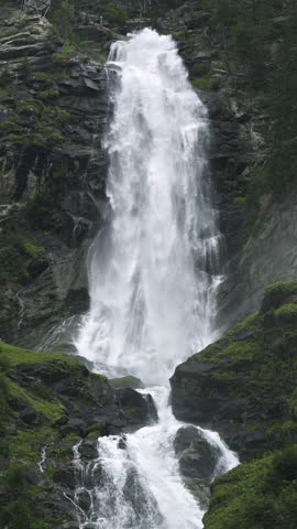 Vertical view of Large Stuibenfall Waterfall in Tirol Alpine Nature