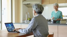 Senior man watching video streaming service on laptop - Powered by Shutterstock - Get 15% off with code: PIKWIZARD15