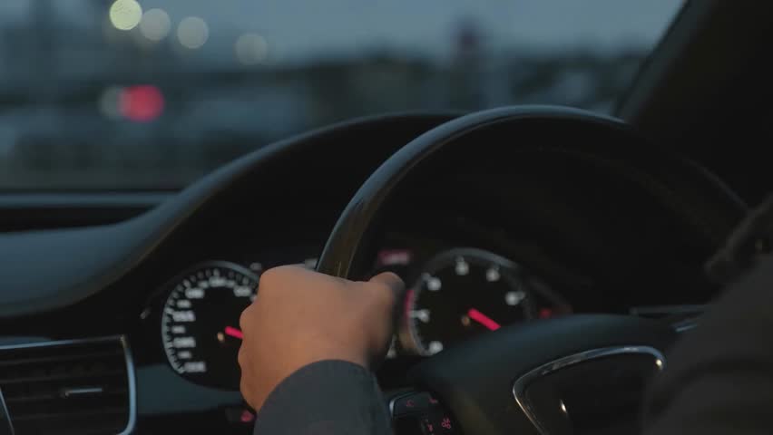 woman hands driving steering wheel driver riding inside automobile road trip drive car ride auto rental vehicle leasing dashboard travelling way. female man male. City transportation. highway street