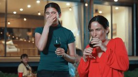 Family celebrate holiday. Mother and grandmother drink wine, cook food while father, grandfather and girl have dinner party food. Outdoor activity spend time together cross generation gap. Divergence. - Powered by Shutterstock - Get 15% off with code: PIKWIZARD15