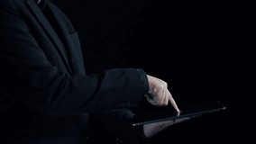 A business analyst utilizes a tablet to explore intricate data visualizations with geometric shapes, glowing elements, and engaging graphics for informed decision-making. Qubit - Powered by Shutterstock - Get 15% off with code: PIKWIZARD15