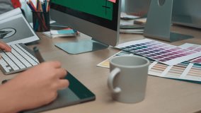 A vibrant creative workspace featuring a digital tablet, computer monitor, and color palette. The workspace inspires artistic design and innovation. Ideal for designers and artists. SACTR - Powered by Shutterstock - Get 15% off with code: PIKWIZARD15