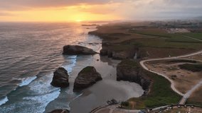sunrise on the coast of Galicia in northern Spain, Playa de Las Catedrales beach in Galicia, tourism in northern Spain. Beautiful cliffs on famous Cathedral Beach, Cantabrian Coast  - Powered by Shutterstock - Get 15% off with code: PIKWIZARD15