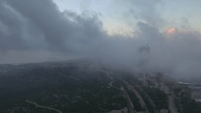 Mount Carmel, located in the city of Haifa, at a misty sunrise from a drone view - Powered by Shutterstock - Get 15% off with code: PIKWIZARD15