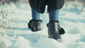 Legs Walking In Black Boots In Winter Snow. Feet Walking Through Snowdrifts Winter Recreation. Seasonal Travel Cold Weather Footwear. Snowy Landscape Cozy Winter Outfit. Fresh Snow Winter Mood Cold - Powered by Shutterstock - Get 15% off with code: PIKWIZARD15