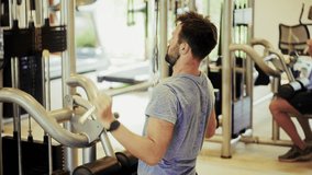 Sporty Man Developing Upper Body. Physical Wellness Routine, Strength Training. Performing Lat Pulldown Exercise At Gym. Athlete Doing Back Workout. Fitness Training In Gym. Physical Muscular Exercise - Powered by Shutterstock - Get 15% off with code: PIKWIZARD15