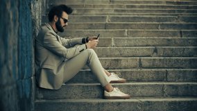 Businessman In Suit Using Smartphone. Urban Business And Modern Lifestyle, Digital Connectivity, Technology Integration Urban Commuting. Professional Using Mobile Phone Outdoors. Digital Communication - Powered by Shutterstock - Get 15% off with code: PIKWIZARD15