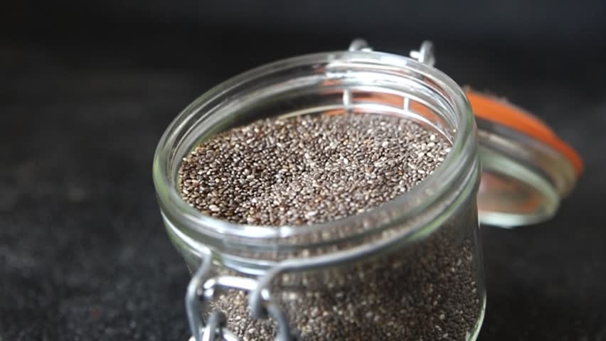 Chia seeds healthy superfood tasty snack fresh delicious gourmet food background on the table rustic food top view copy space keto and paleo diet vegan and vegetarian food