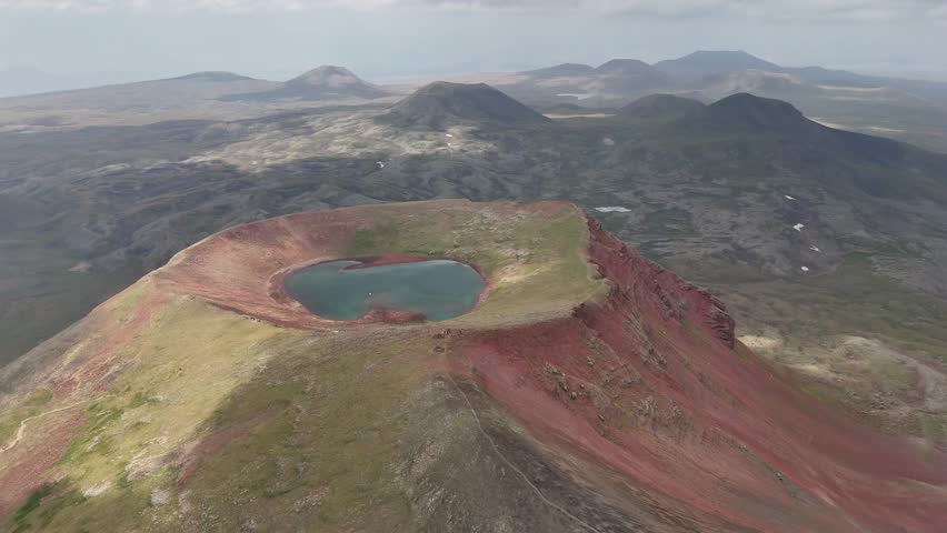 Mountain Lake at the Foot of a Cone-Shaped Peak