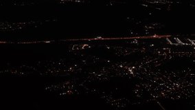 Big night city lights top view from above. View from the airplane window. - Powered by Shutterstock - Get 15% off with code: PIKWIZARD15