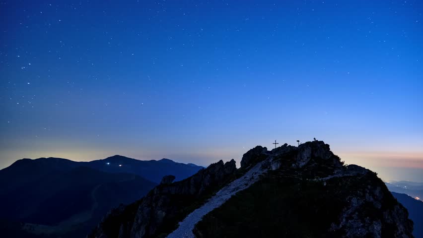Timelapse of Starry Night Sky with Star Above Mountain Peak with Cross in Carpathian Landscape