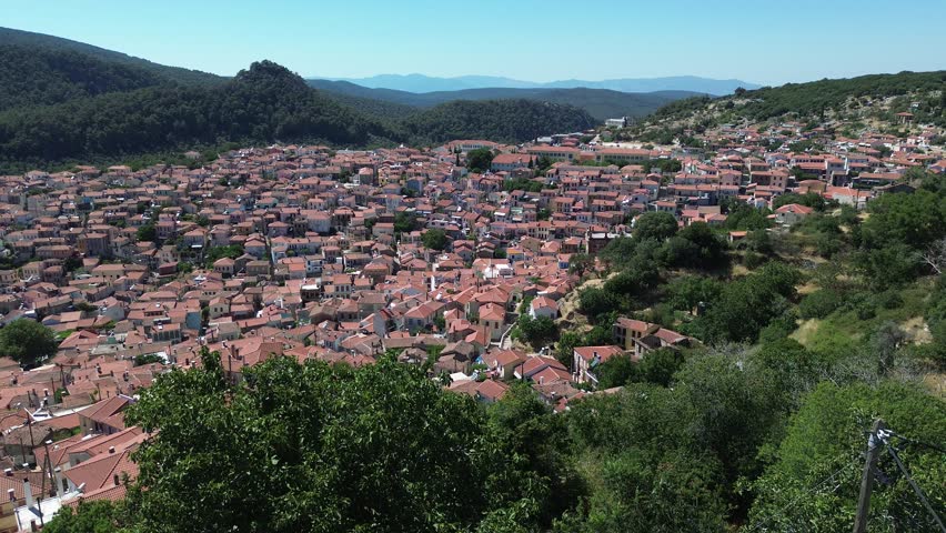 Agiasos, Island Lesvos, Greece - July 14th, 2025 - footage of the mountain town, traditional architecture, streets, roofs, temples, green forest, slopes and panoramic views