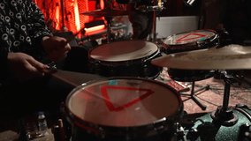 An array of drums featuring marked heads, prepared for a live performance, captures the anticipation and excitement of musicians as they gear up to share their passion, fa01 - Powered by Shutterstock - Get 15% off with code: PIKWIZARD15