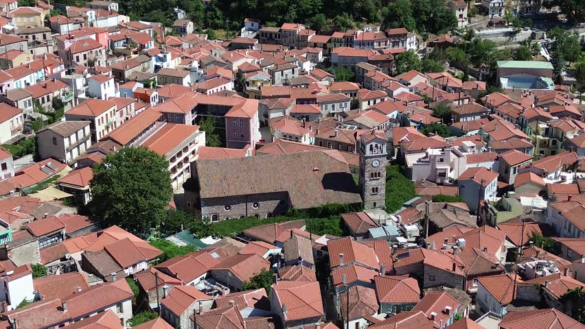 Agiasos, Island Lesvos, Greece - July 14th, 2025 - footage of the mountain town, traditional architecture, streets, roofs, temples, green forest, slopes and panoramic views