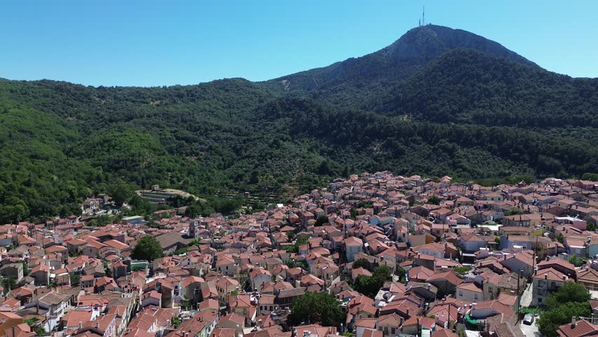 Agiasos, Island Lesvos, Greece - July 14th, 2025 - footage of the mountain town, traditional architecture, streets, roofs, temples, green forest, slopes and panoramic views