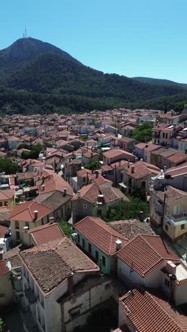 Agiasos, Island Lesvos, Greece - July 14th, 2025 - footage of the mountain town, traditional architecture, streets, roofs, temples, green forest, slopes and panoramic views