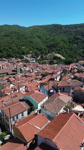 Agiasos, Island Lesvos, Greece - July 14th, 2025 - footage of the mountain town, traditional architecture, streets, roofs, temples, green forest, slopes and panoramic views