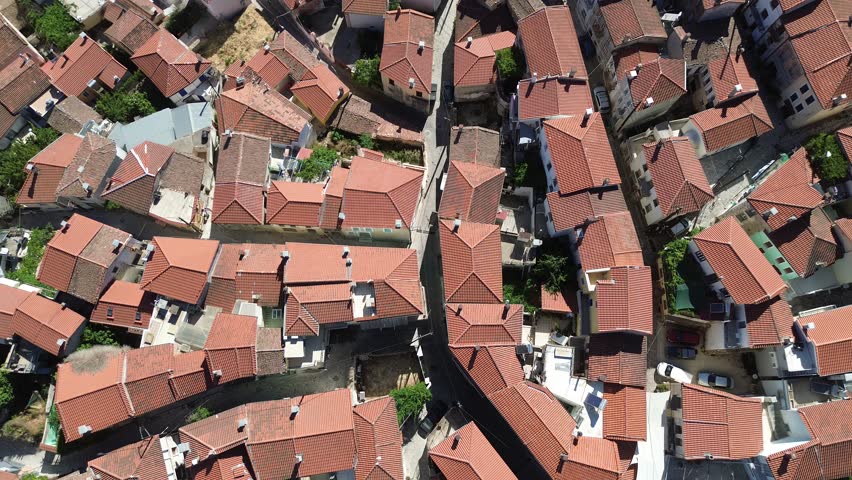 Agiasos, Island Lesvos, Greece - July 14th, 2025 - footage of the mountain town, traditional architecture, streets, roofs, temples, green forest, slopes and panoramic views