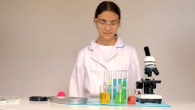 Laboratory research test tubes reagents and microscope. Selective focus. - Powered by Shutterstock - Get 15% off with code: PIKWIZARD15