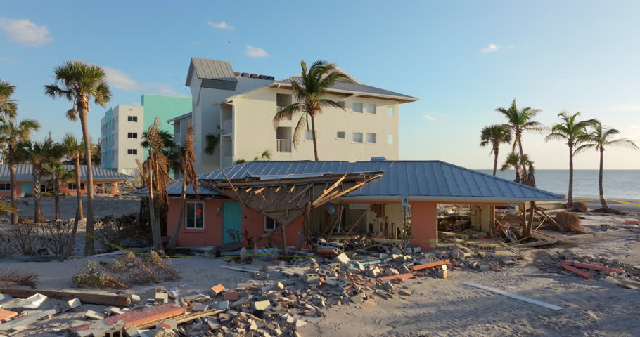 Destroyed houses on ocean shore after hurricane Milton landfall. Natural disaster consequences on Manasota Key, Florida. Storm surge severe damage.