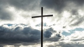 Dramatic Stormy Clouds Behind Christian Cross, Spiritual Religious Background - Powered by Shutterstock - Get 15% off with code: PIKWIZARD15