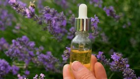 Lavender essential oil in a bottle. Selective focus. - Powered by Shutterstock - Get 15% off with code: PIKWIZARD15