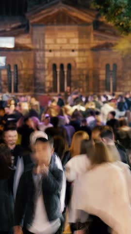Timelapse Crowd of People Walking a Busy Street at City. People in Motion Blur and Vibrant Big Town Atmosphere. Representing Urban Life and Activity Video Showing a Large Group Persons Along Outdoor