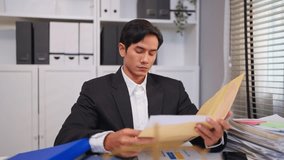Asian lawyer working with gavel and scales of justice in courtroom office. Attractive attorney reviews papers and documents at desk, representing law and legal business services concept in workplace. - Powered by Shutterstock - Get 15% off with code: PIKWIZARD15