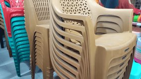 Pile of chair from plastic material in the shop - Powered by Shutterstock - Get 15% off with code: PIKWIZARD15