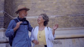 Senior Tourist Couple Walking in the City - Powered by Shutterstock - Get 15% off with code: PIKWIZARD15