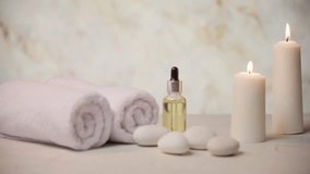 Serene Spa Still Life With Towels Candles And Essential Oil - Powered by Shutterstock - Get 15% off with code: PIKWIZARD15