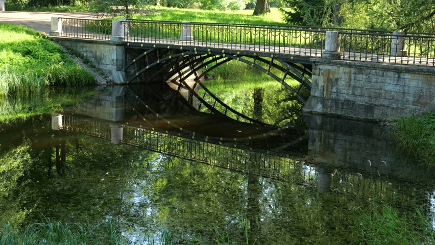Bridge over the overgrown pond in Catherine Park, Tsarskoye Selo, Russia